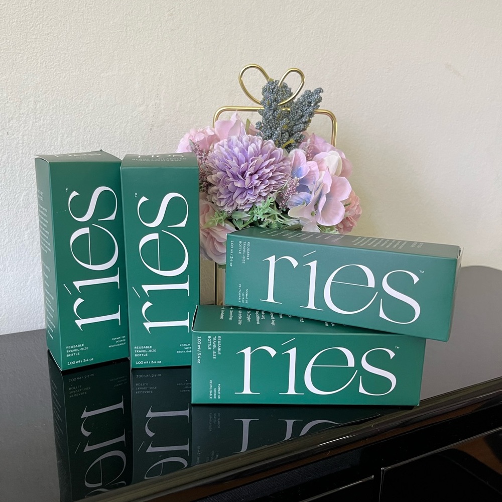 reis Essential Travel Bottles Set of 4 - NEW